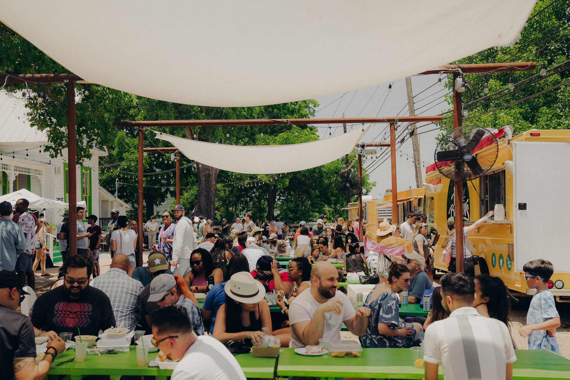 Packed festival at golden hour